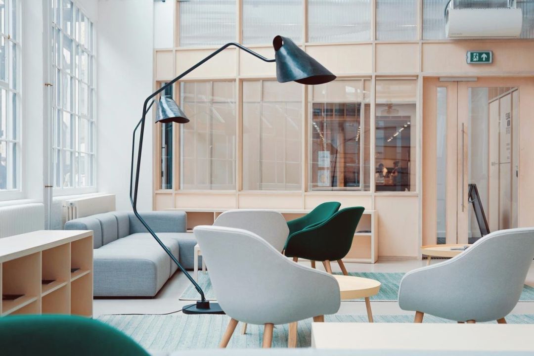 Compact L-shaped desk in small office